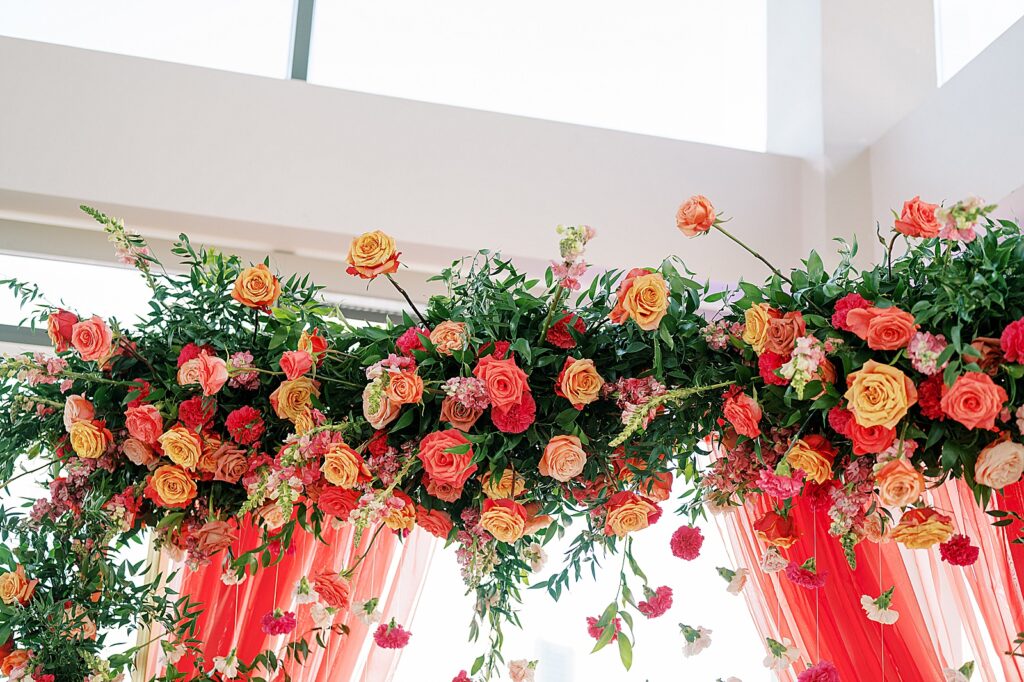 Wedding by epic floral display inside Ventanas Atlanta 